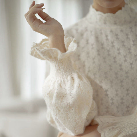 Bluse mit Gänseblümchenspitze