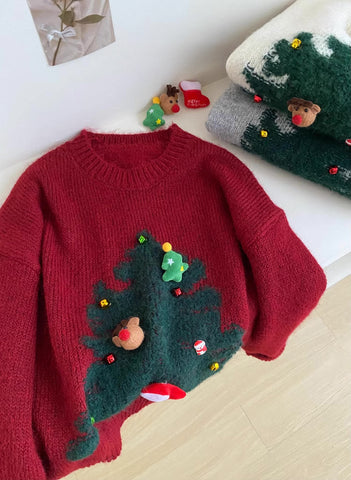 Suéter con dijes de árbol de Navidad