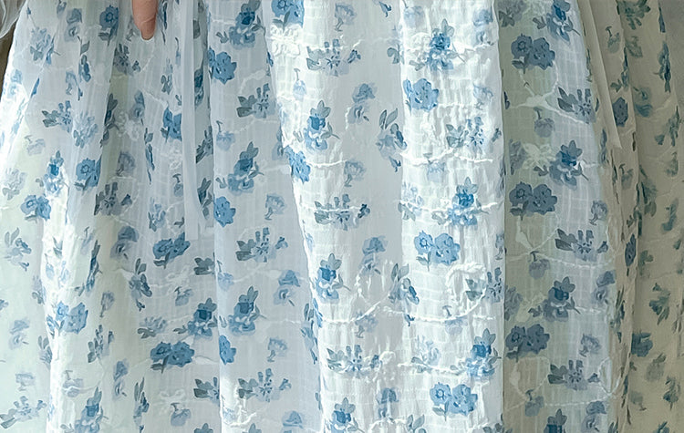 Vestido camisola con cordones y flores de mayo