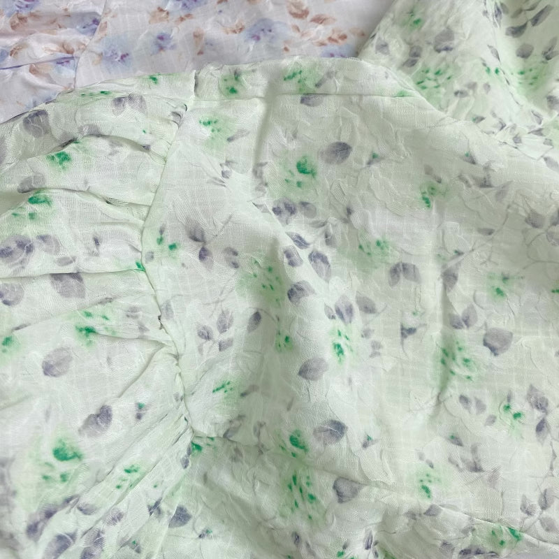 Vestido mini de tirantes con rosa descolorido