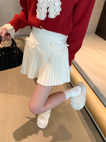 Minifalda plisada con lazo pequeño