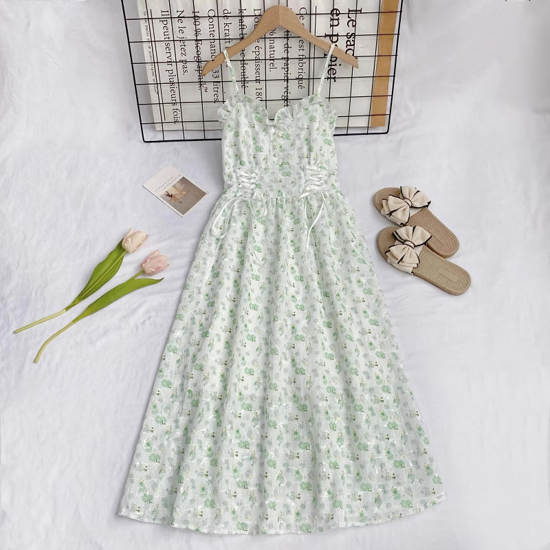 Vestido camisola con cordones y flores de mayo