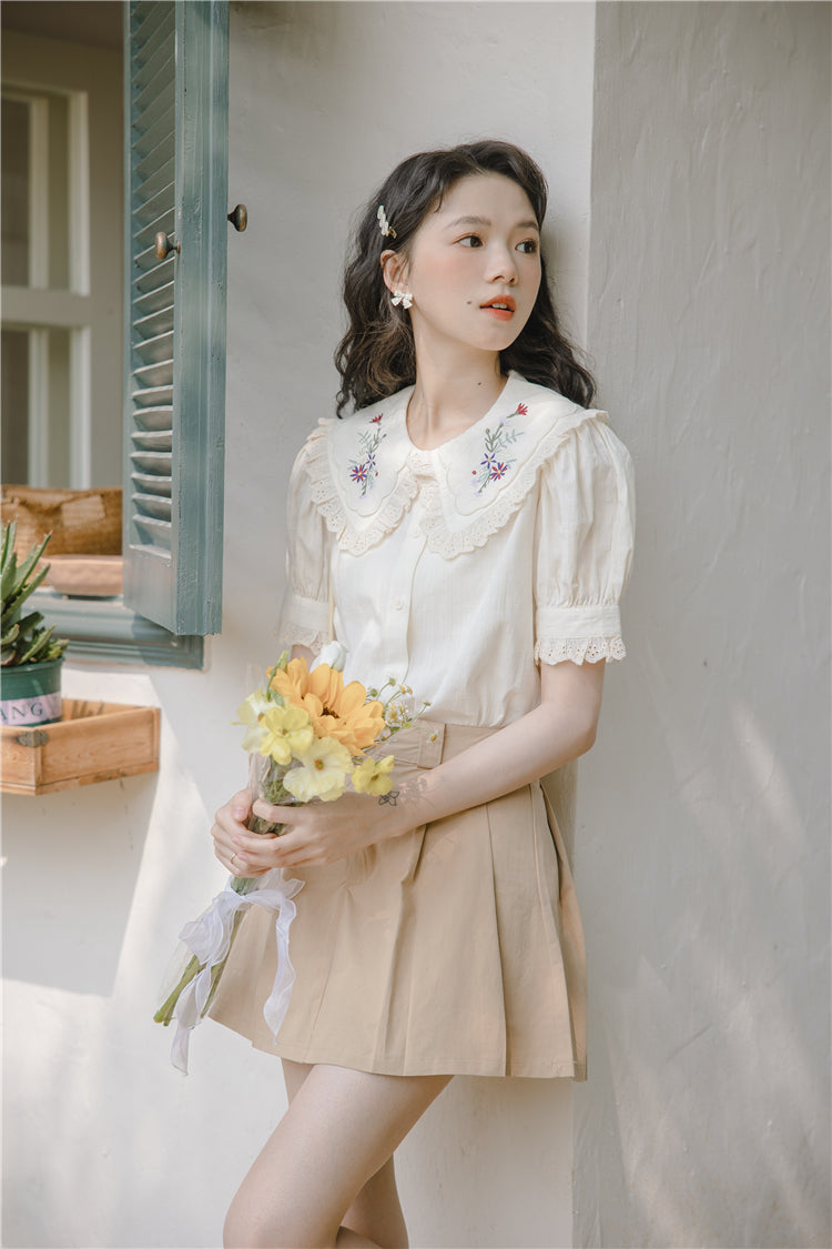 Blusa bordada con flores silvestres