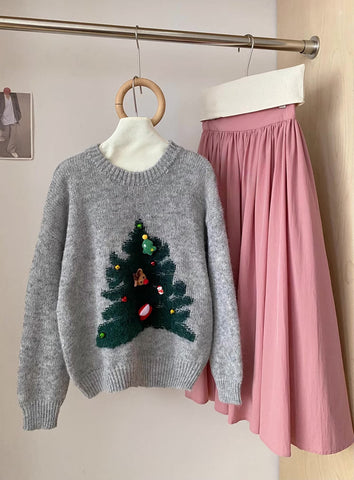 Suéter con dijes de árbol de Navidad