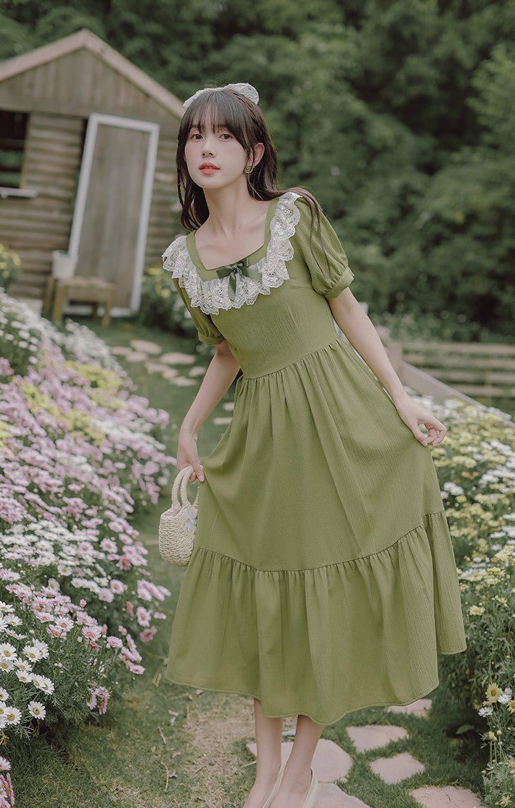 Vestido midi con corsé y margaritas de color matcha