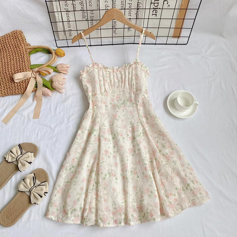 Vestido mini de tirantes con rosa descolorido
