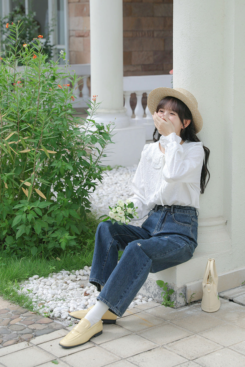 Jeans mit Gänseblümchen-Stickerei