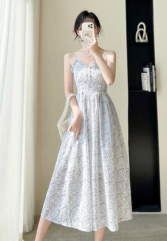 Vestido camisola con cordones y flores de mayo