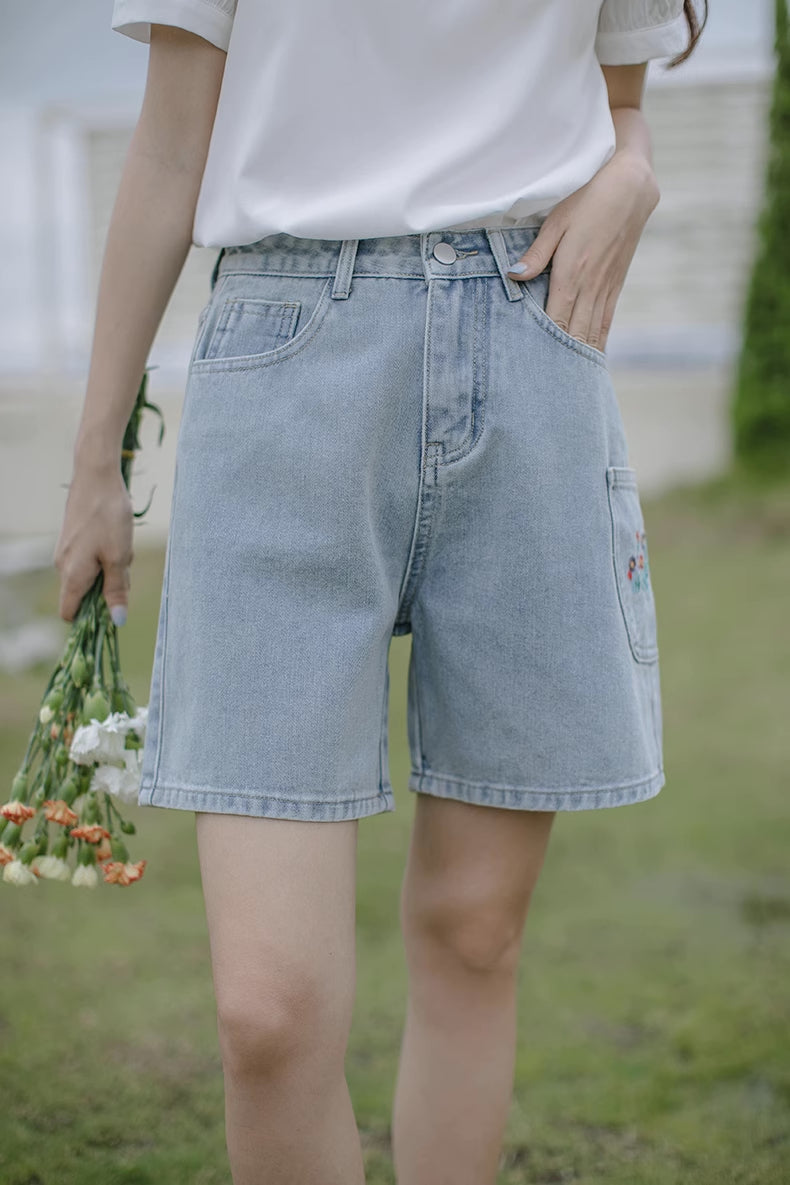 Pantalones cortos bordados con bolsillo de flores