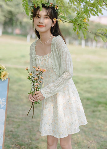 Vestido mini de tirantes con rosa descolorido