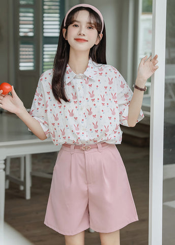 Camisa abotonada con conejito rosa