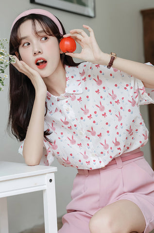 Camisa abotonada con conejito rosa