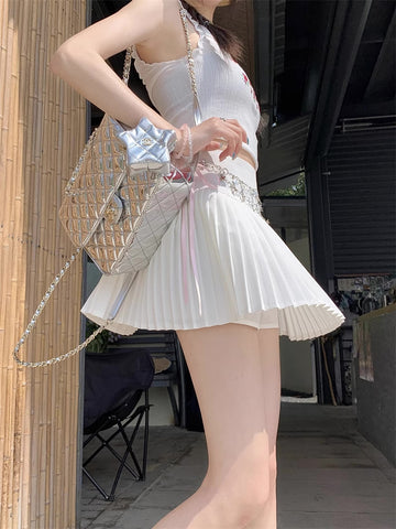 Mini-Faltenrock mit Sternkette