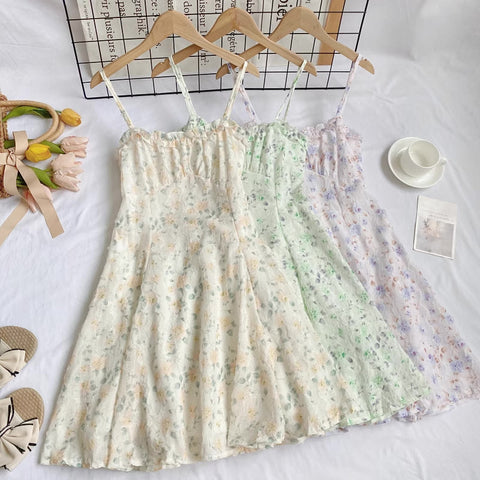 Vestido mini de tirantes con rosa descolorido