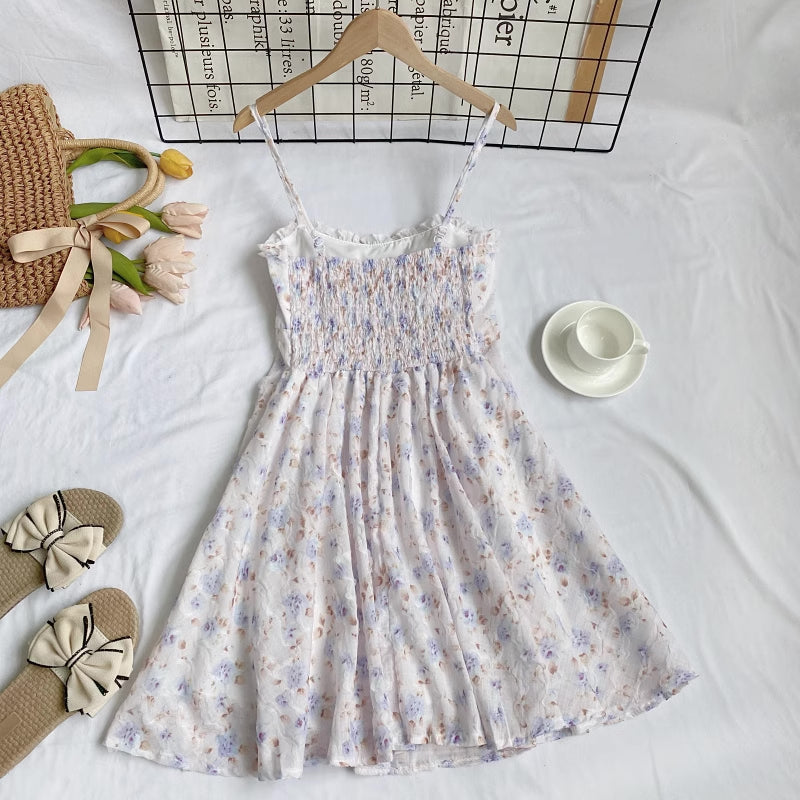 Vestido mini de tirantes con rosa descolorido