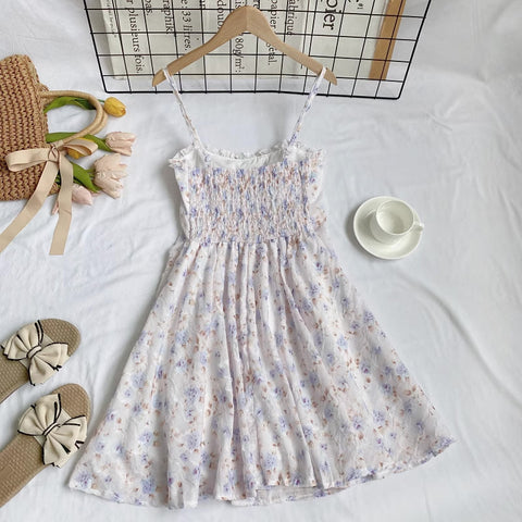 Vestido mini de tirantes con rosa descolorido