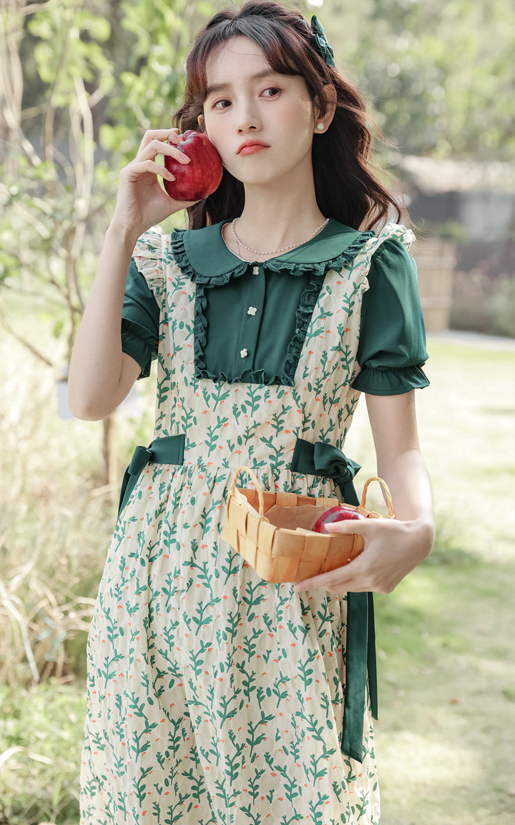 Vestido dos piezas con pechera y capullos de flores