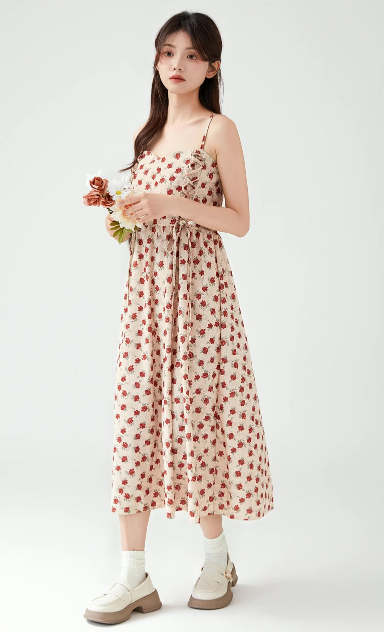 Vestido midi de tirantes con encaje floral