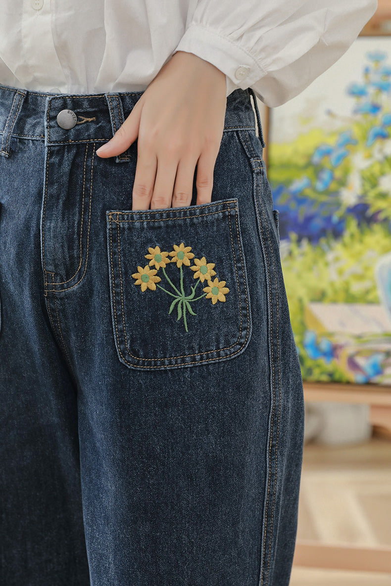 Jeans mit bestickter Sonnenblumentasche