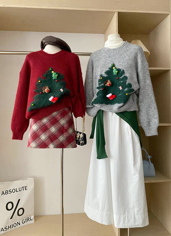 Suéter con dijes de árbol de Navidad