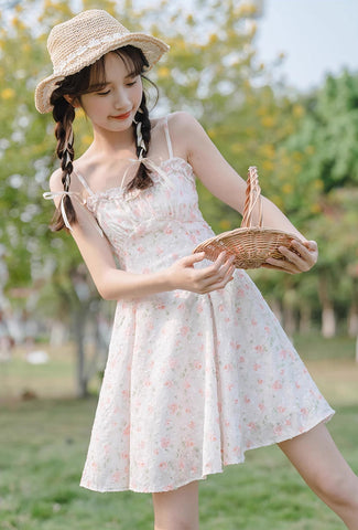 Vestido mini de tirantes con rosa descolorido