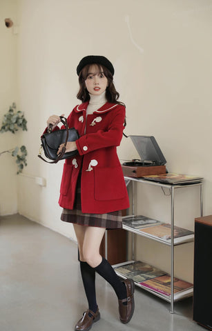 Abrigo tipo trenca con cuello Peter Pan y botones