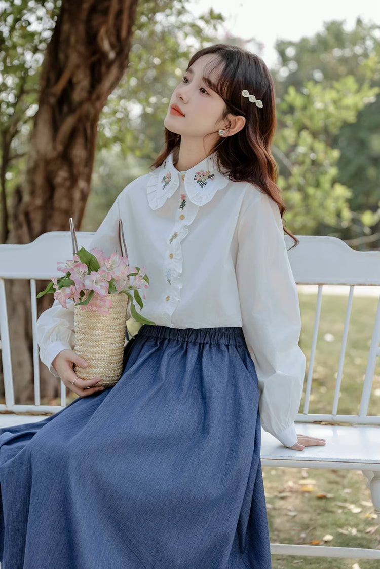 Blusa bordada con ramo floral