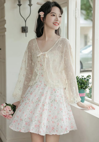 Vestido mini de tirantes con rosa descolorido