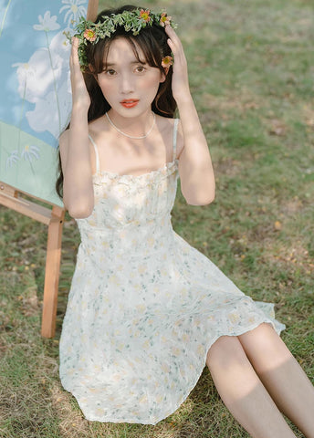 Vestido mini de tirantes con rosa descolorido