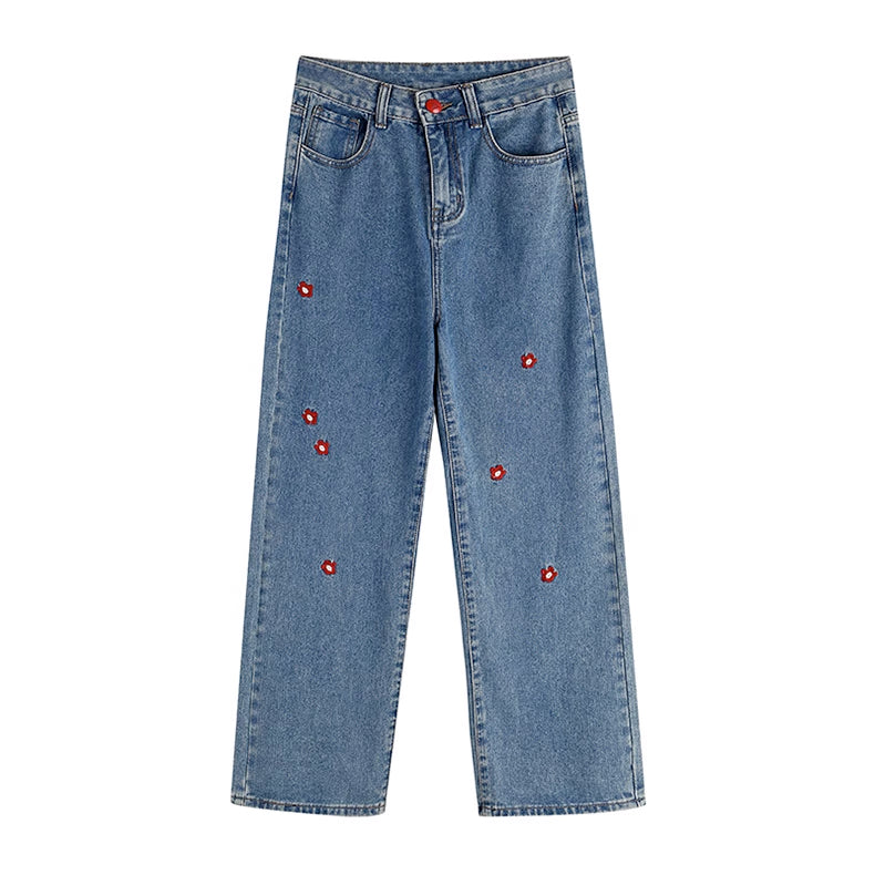 Jeans mit aufgestickten Gänseblümchen