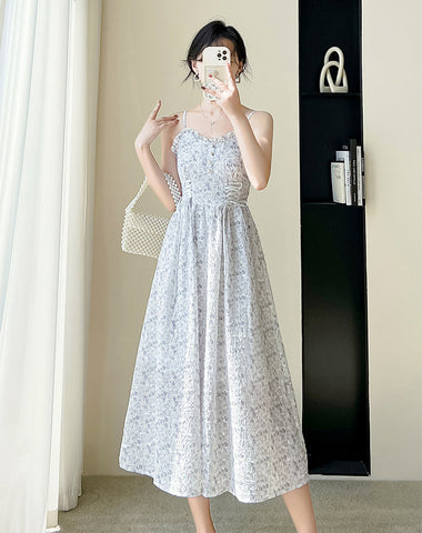 Vestido camisola con cordones y flores de mayo