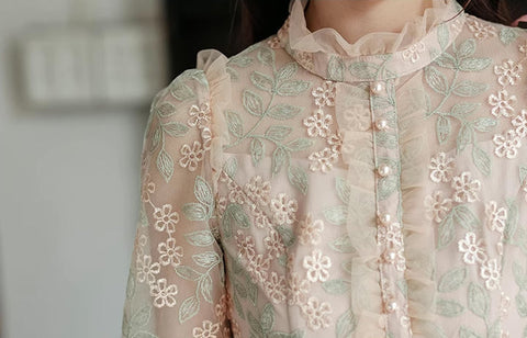 Vestido midi con bordado de flores