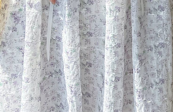 Vestido camisola con cordones y flores de mayo