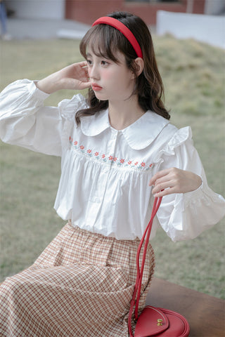 Camisa con botones y bordado de cadena de margaritas