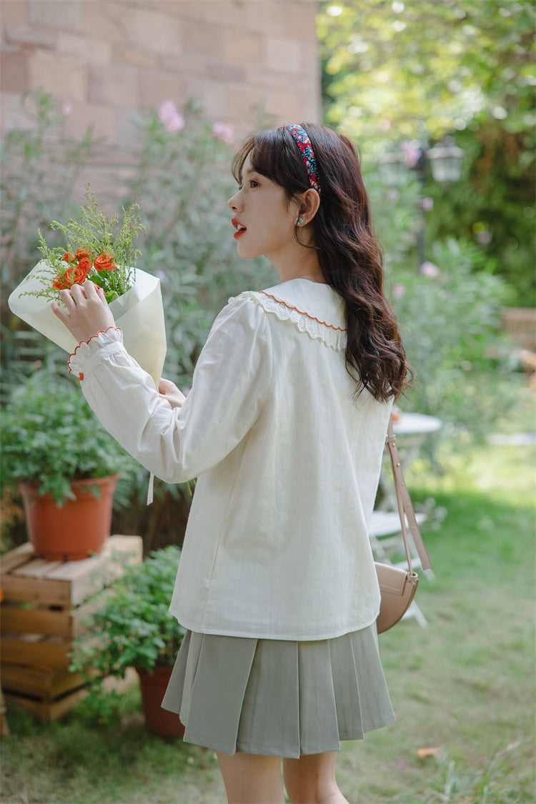 Bluse mit Blumenstickerei