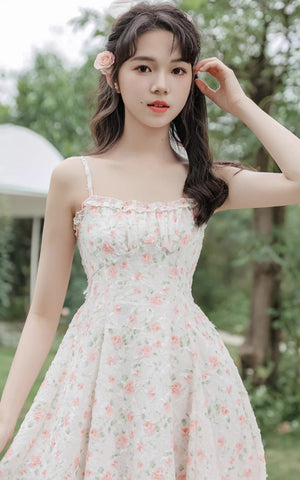 Vestido mini de tirantes con rosa descolorido