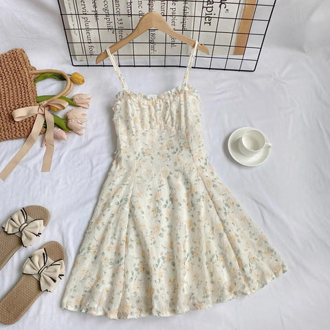Vestido mini de tirantes con rosa descolorido
