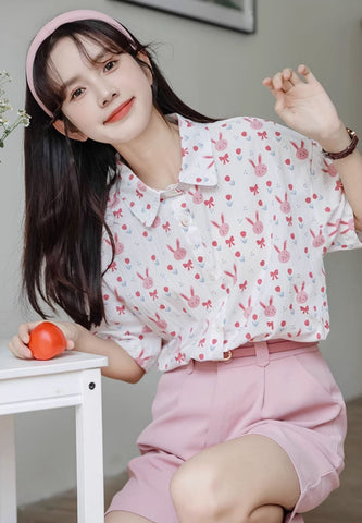 Camisa abotonada con conejito rosa