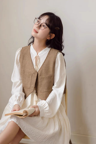 Chaleco corto de tweed con bolsillos