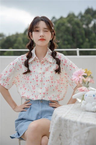 Camisa corta con botones de conejito rosa
