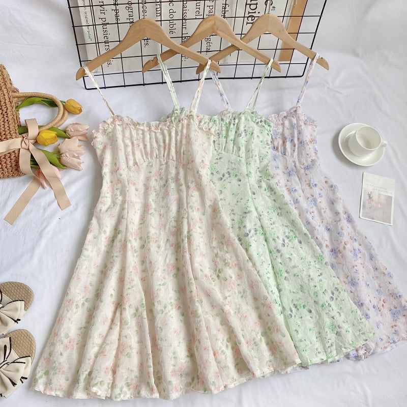 Vestido mini de tirantes con rosa descolorido