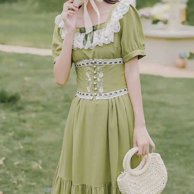 Vestido midi con corsé y margaritas de color matcha