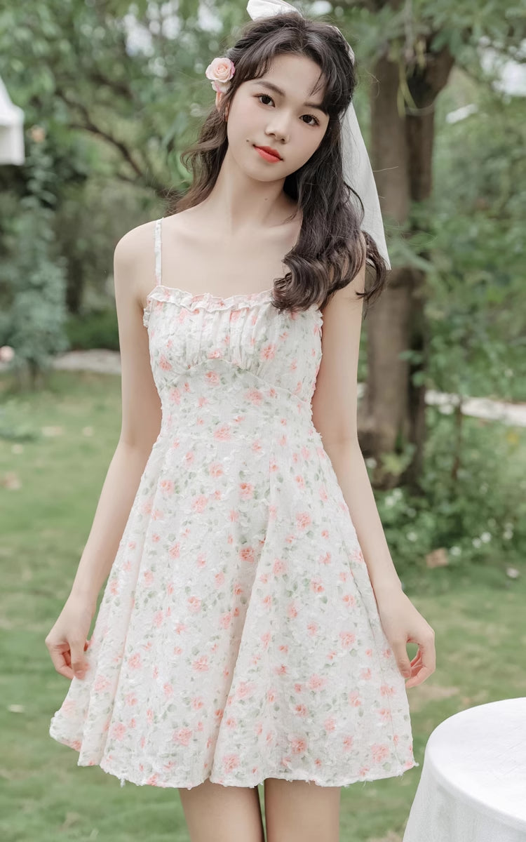 Vestido mini de tirantes con rosa descolorido