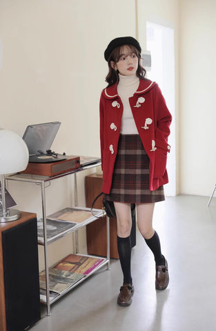 Abrigo tipo trenca con cuello Peter Pan y botones