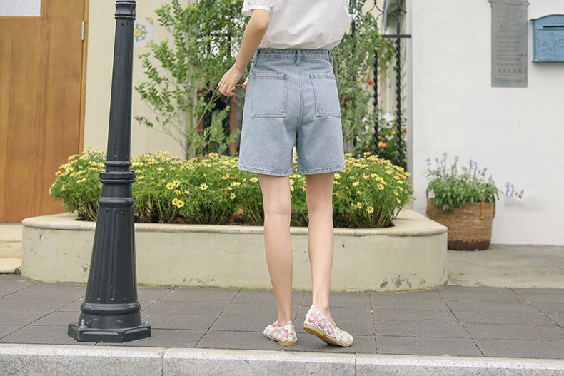 Shorts mit Blumenstickerei