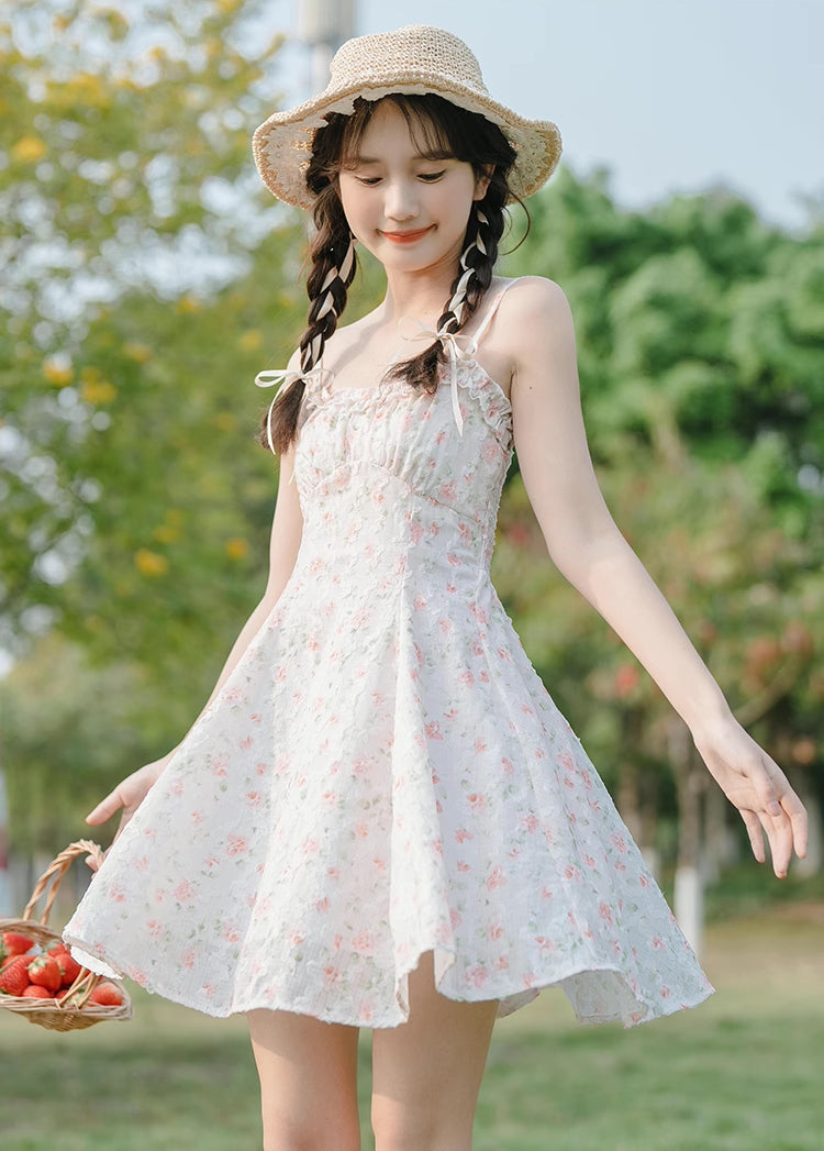 Vestido mini de tirantes con rosa descolorido