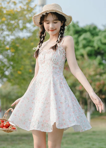 Vestido mini de tirantes con rosa descolorido