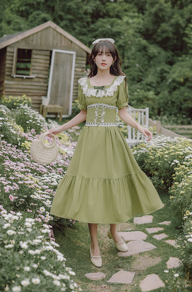 Vestido midi con corsé y margaritas de color matcha