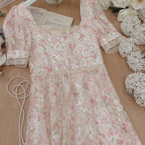 Vestido midi con cordones y estampado floral