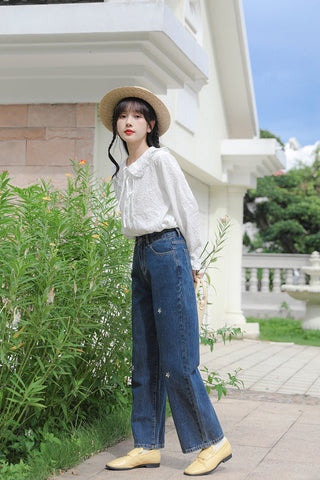 Jeans mit Gänseblümchen-Stickerei